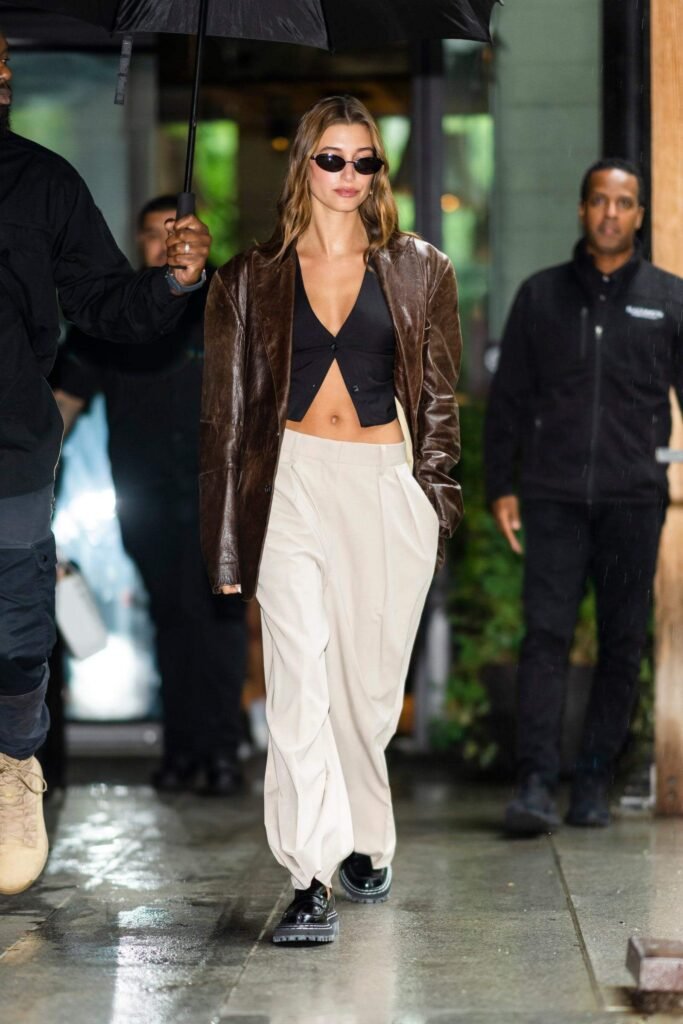 A wider shot of Hailey Bieber in a fashionable outfit