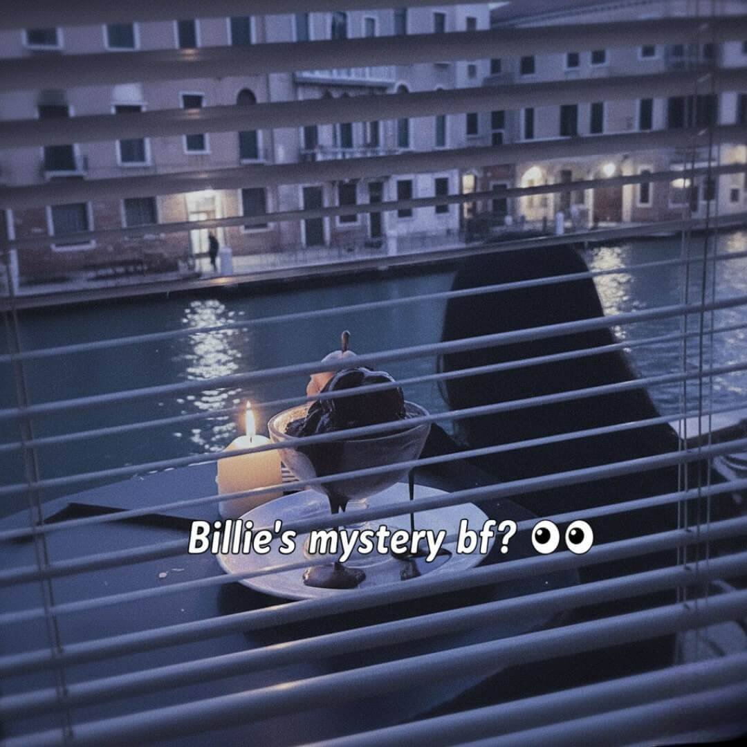 Night photo through window blinds of a shadowy figure, melting chocolate gelato, and a Venice canal.