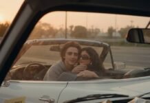 Are Timothée Chalamet and Kylie Jenner Still Together? Here’s What We Know Candid shot from a stakeout van of Timothée Chalamet and Kylie Jenner in a convertible at sunset, with binoculars on the dash.